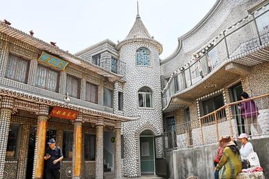 山東青島：海島&ldquo;貝殼樓&rdquo;引游人